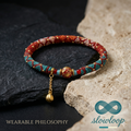 Slowloop | Oriental Fusion: Hand-Woven Teal & Crimson Bracelet with Lotus Charm & Enameled Bead